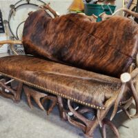 Antler sofa with rawhide upholstery