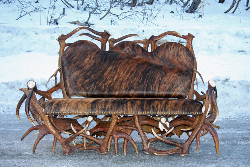 Unique artisan antler sofa designed as a living room focal point