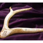 Alaska Malamute scrimshaw cribbage board