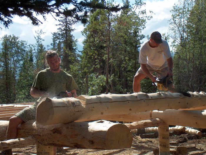 Chainsaw notch work log cabin