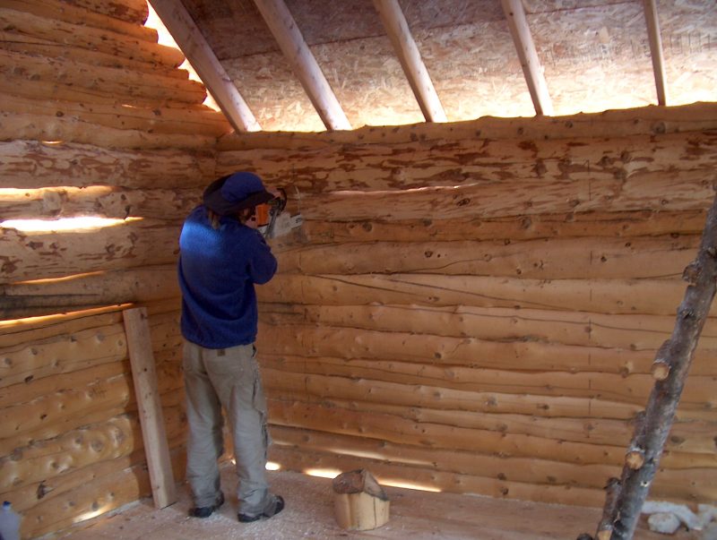 cutting windows in log cabin