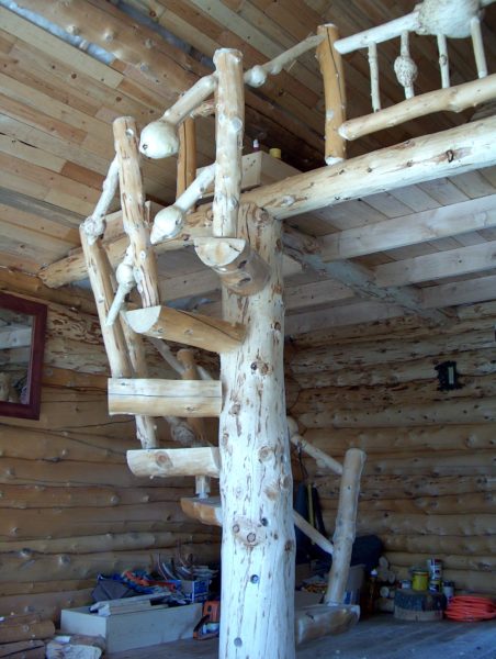 finished log spiral stairs