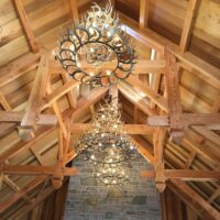 Magnificent lodge with three 4 tier antler chandeliers