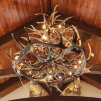 Holland Peak 19-light mule deer and elk antler chandelier in a vaulted great room