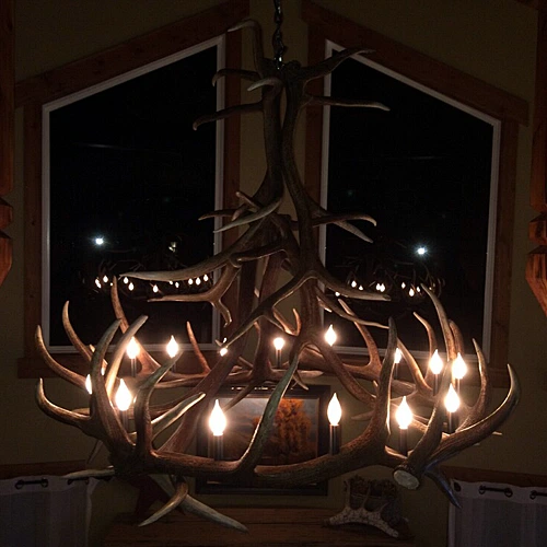 Handcrafted trophy elk antler chandelier for rustic lodge interior