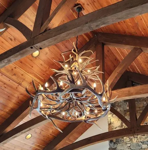 Holland Peak Large trophy elk and mule deer antler chandelier in a rustic great room